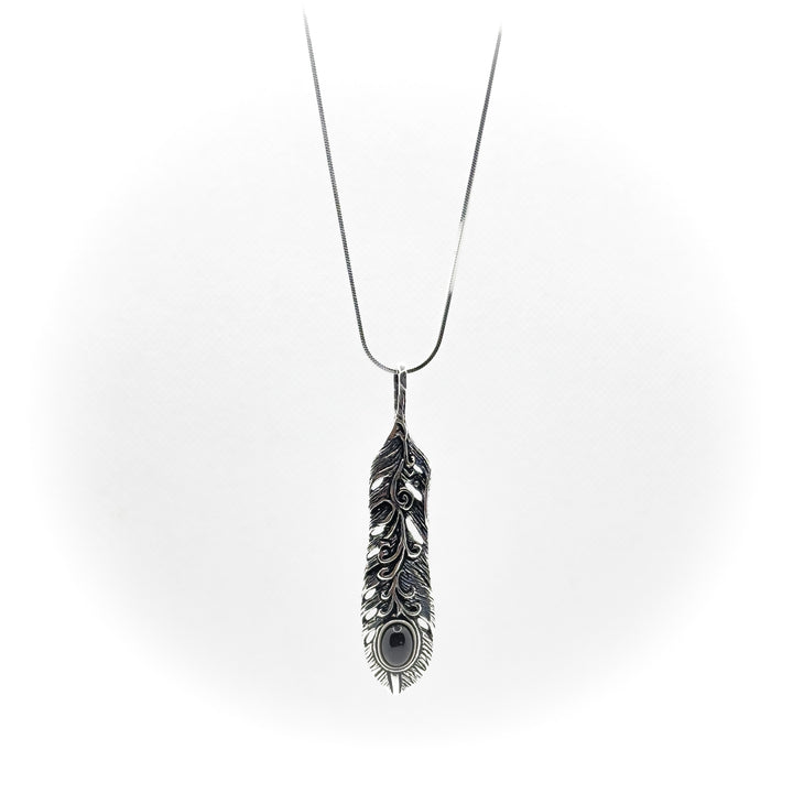 Krishna's feather pendant