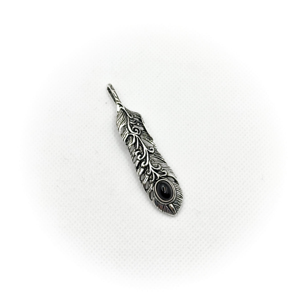 Krishna's feather pendant