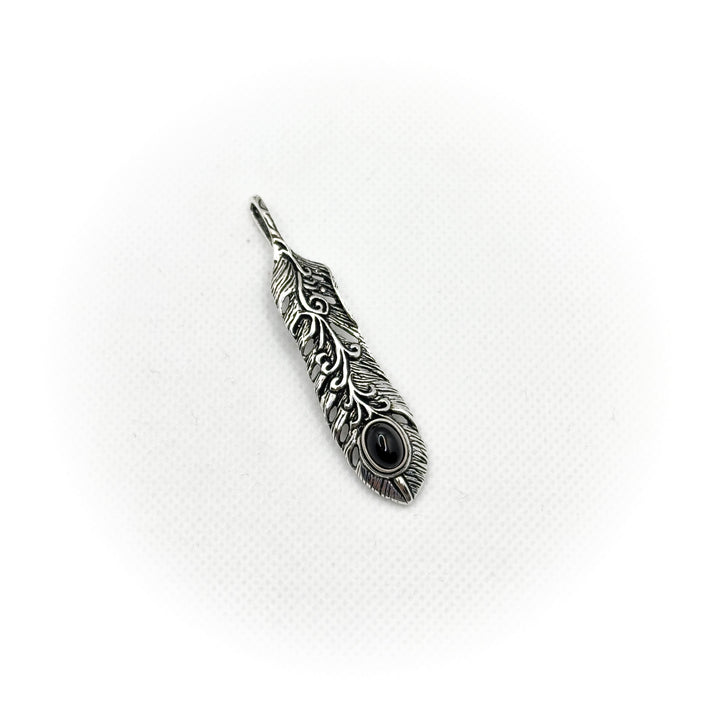 Krishna's feather pendant